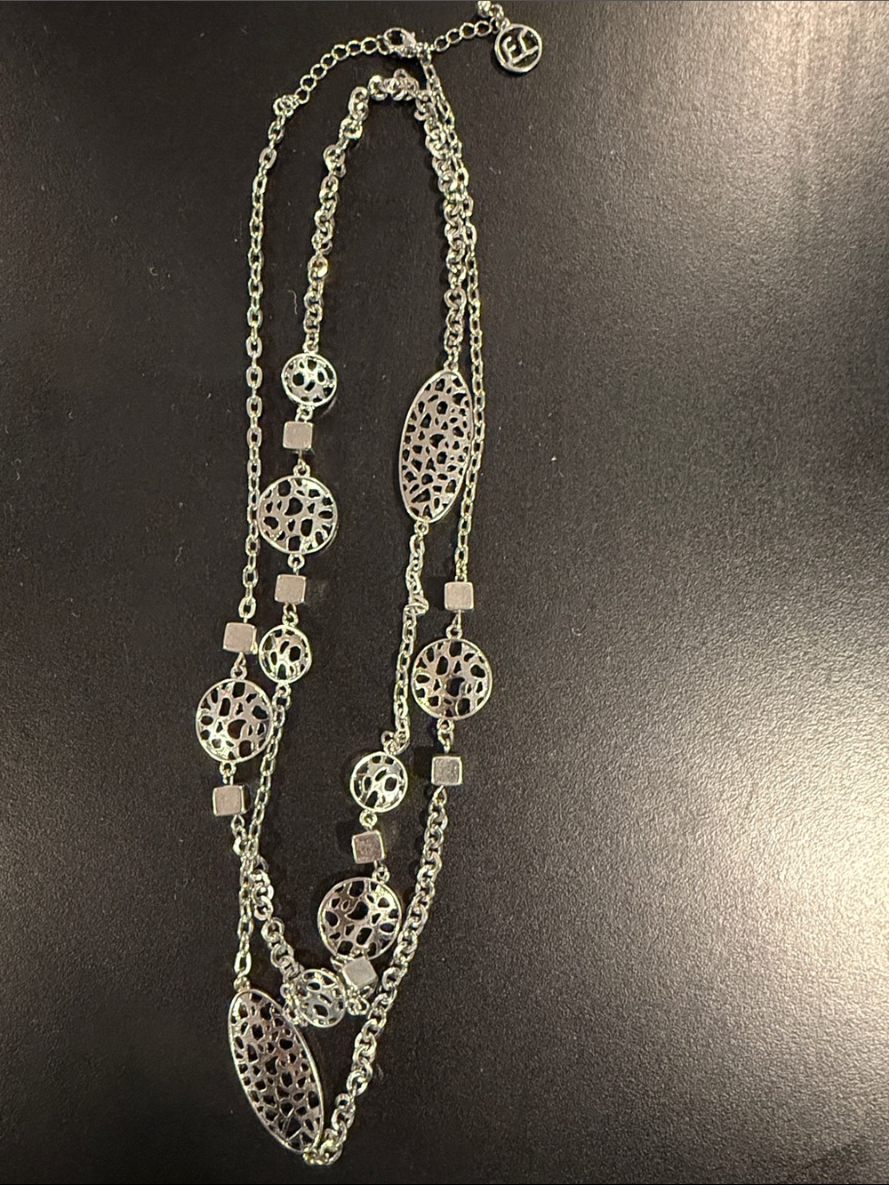 Erica Lyons Silver Multi-Element Layered Necklace